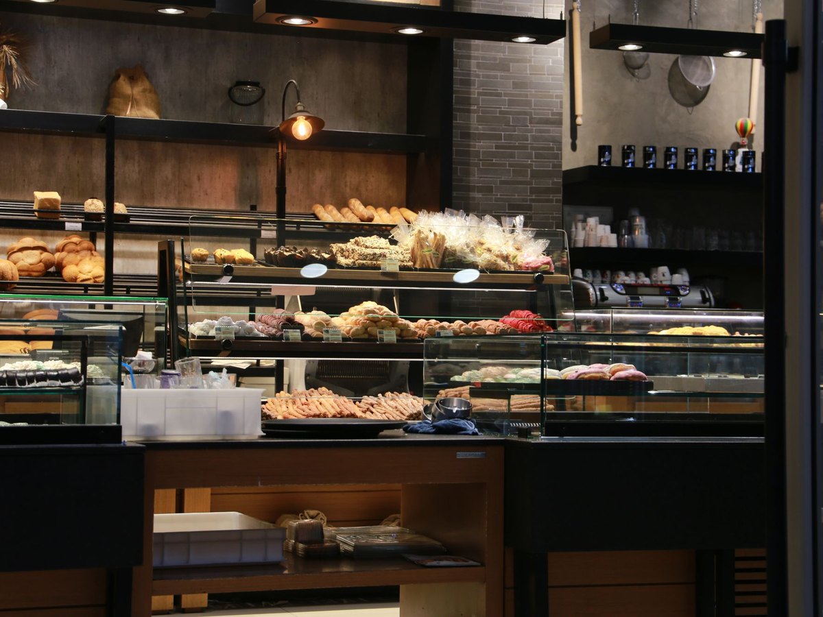Bakery counter with breads and pastries for collection