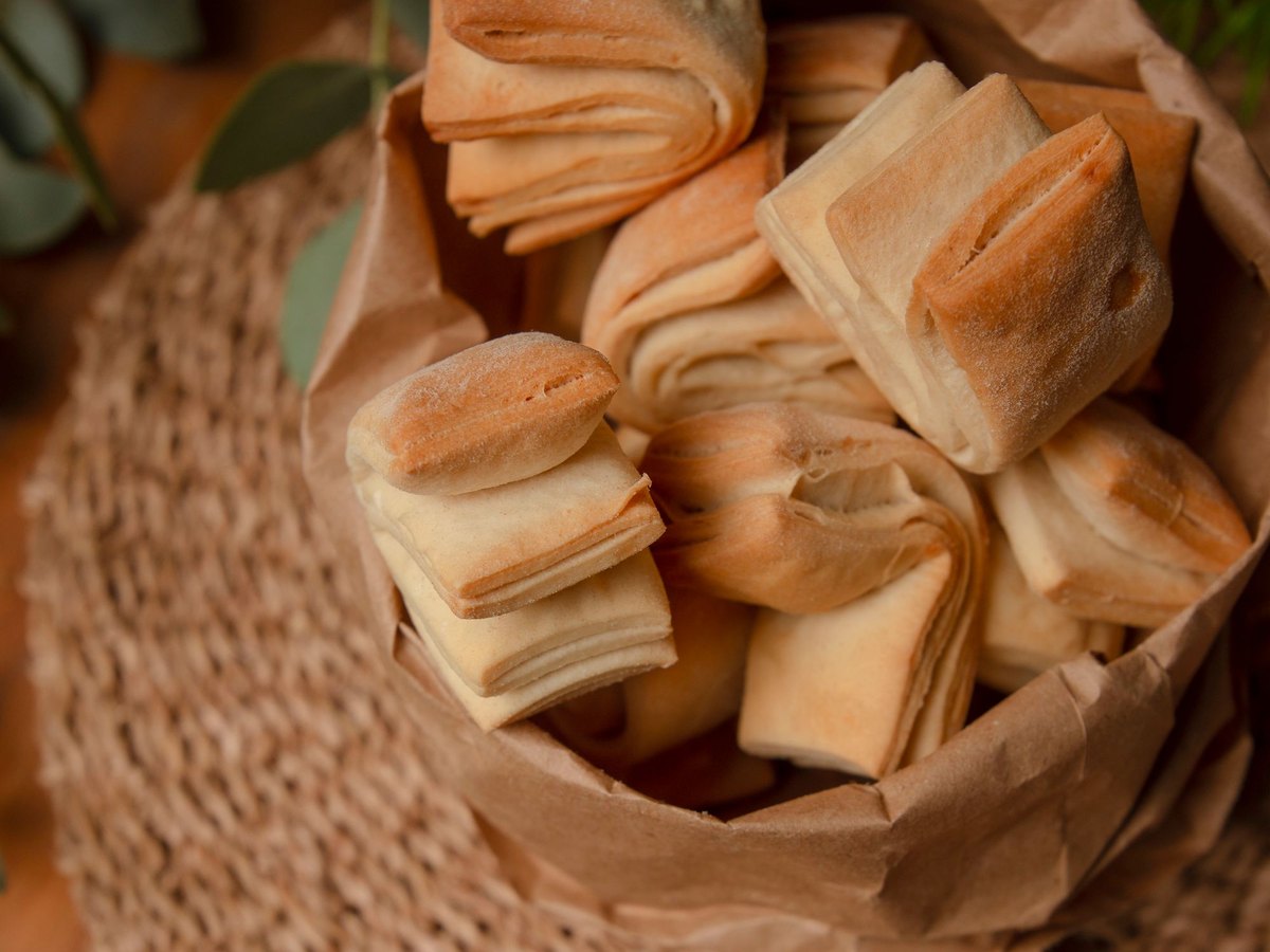 Baked goods packed in a paper bag for takeaway